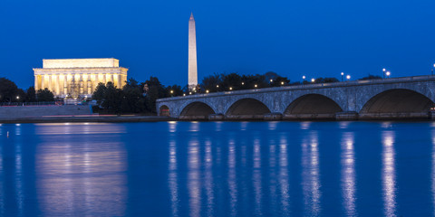 APRIL 10, 2018 - WASHINGTON D.C. - Memorial Bridge at dusk spans Potomac River and features Lincoln Memorial and Washington Monument