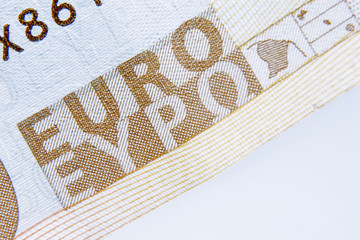 A fragment of a banknote with the inscription EURO as a symbol сurrencies of the European Union