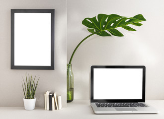 Desk of freelancer with laptop, plant. Style home office workspace desk. Mock up.