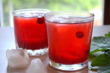 Cranberry juice or lemonade. Red refreshing drink