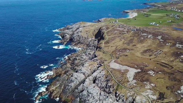 aerial footage of beautiful landscape with cliffs and ocean in northern point of Ireland, Malin Head  