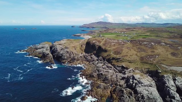 aerial footage of beautiful landscape with cliffs and ocean in northern point of Ireland, Malin Head  