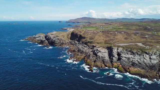 aerial footage of beautiful landscape with cliffs and ocean in northern point of Ireland, Malin Head  