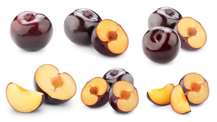 plums isolated on white