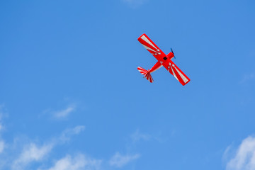 Fototapeta na wymiar Homemade radio control aircraft on blue sky.