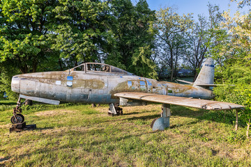 Old aircraft close up on grass