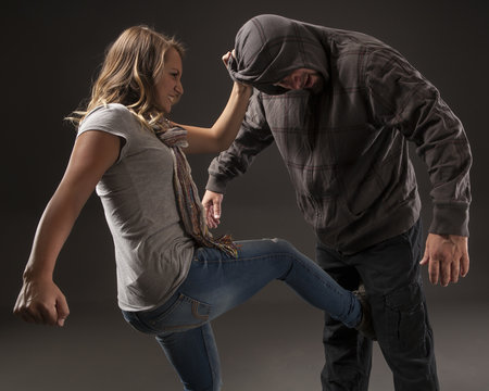 Teenage girl uses self defense skills to fight back.