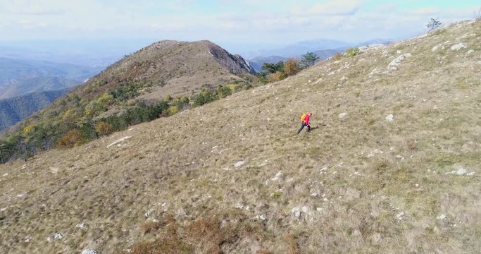 Aerial view of man hiking on the mountain - Domogled, Transylvania