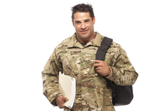 Smiling soldier with bag and books