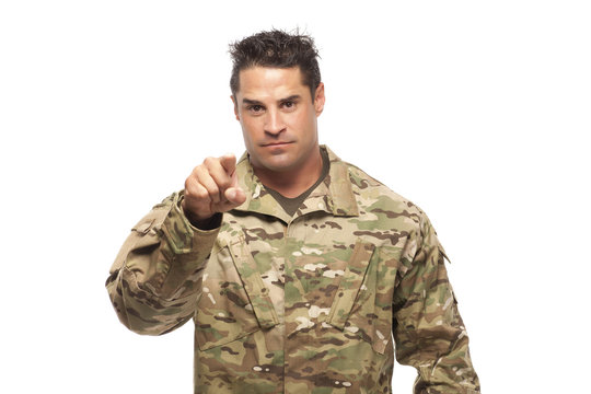 Army soldier pointing at camera