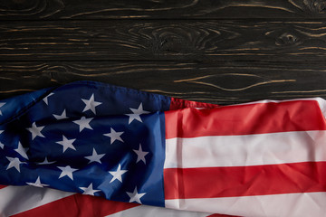 top view of united states flag on wooden surface