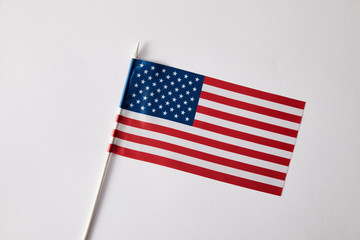 closeup view of united states of american flagpole on white surface