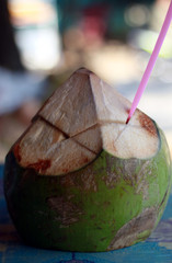 Young coconut. A refreshing and hydrating beverage. The young meat can be eaten.