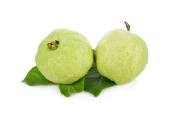 whole fresh guava with leaves on white background