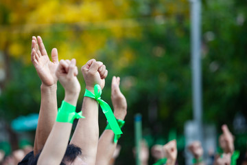 People raised hand air fighting for protest