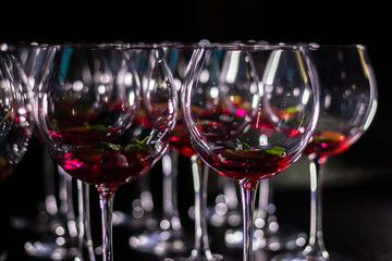 Glasses with a filling for a cocktail on the table