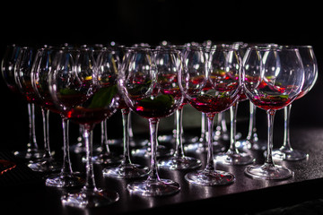 Glasses with a filling for a cocktail on the table