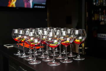 Glasses with a filling for a cocktail on the table