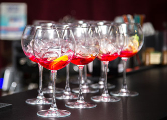 Glasses with a filling for a cocktail on the table