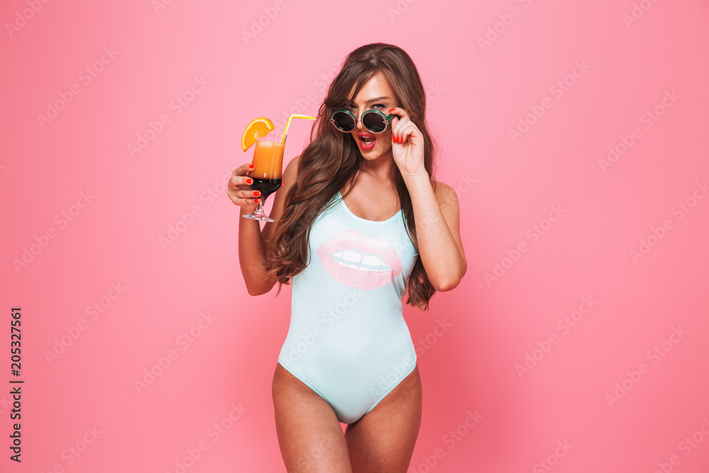 Wall mural portrait of a sexy young woman dressed in swimsuit