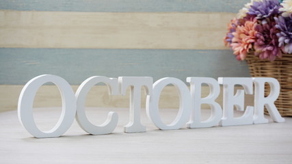 October alphabet letter with space background