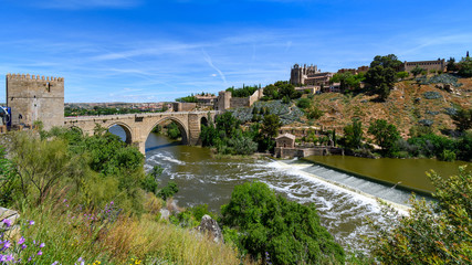 Fototapeta na wymiar San Martin's Bridge and panorama of Toledo, Spain