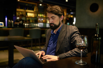 Working and drinkig wine