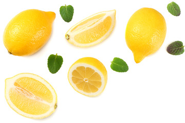 Fototapeta na wymiar healthy food. sliced lemon with green leaf isolated on white background top view