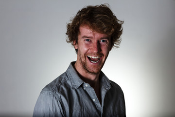Fototapeta premium Young madman and his psychotic laugh