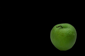 Apple on black background