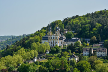 Fototapeta na wymiar The pilgrimage church Kaeppele on a hill in Wuerzburg on a sunny day