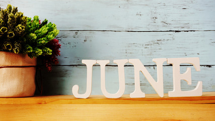 june alphabet letter with space background