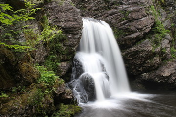 Fototapeta na wymiar Large Waterfall in Summer (James River Falls, Antigonish County, Nova Scotia)