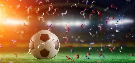Football ball on the field of a world cup stadium with  streamers - 3d rendering