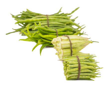 Guar or Cluster Bean With Others Vegetables Also Known as Gavar, Guwar or Guvar Bean isolated on White Background