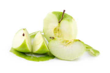 Ripe green apple and slice isolated on a white background