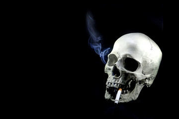 humal skull smoking to die, no smoking day, smoking kill your self, on black background
