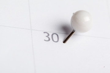 Closeup of dates on calendar page