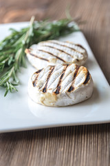 Grilled Camembert cheese with fresh rosemary