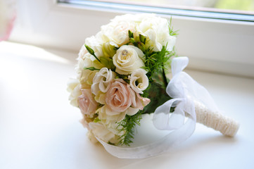 Beautiful wedding bouquet of white and pink roses.