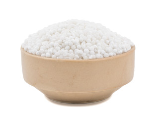 White Sago Pearls in Bowl Also Know as Sabudana, Tapioca Pearl or Sago Seeds isolated on White Background