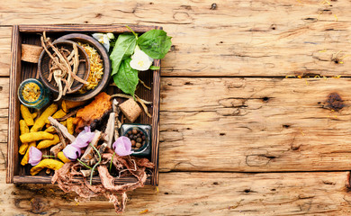 Healing herbs in wooden box
