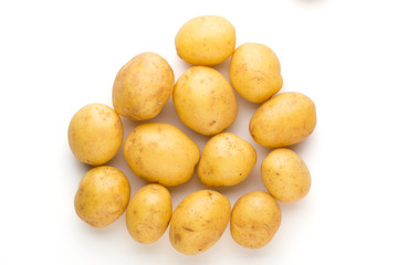 New potato and rosemarin isolated on white background close up.
