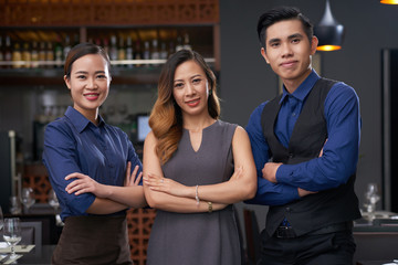 Cheerful restaurant team