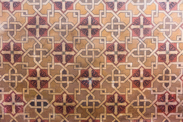 painting of artistic geometric motif inside the hall of an ancient medieval castle