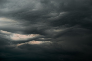 Dramatic dark black sky cloud storm pattern
