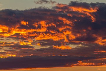 Dramatic clouds in a sunset light
