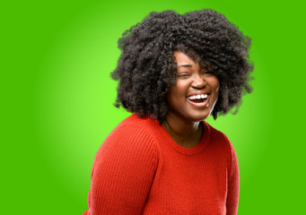 Fototapeta na wymiar Beautiful african woman confident and happy with a big natural smile laughing