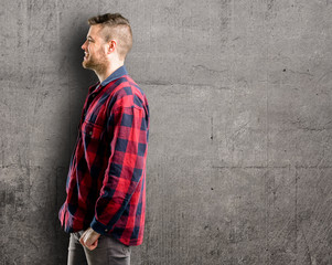 Young handsome man side view portrait