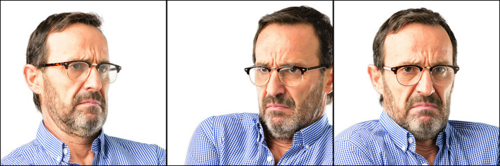 Obraz premium Middle age handsome man closeup with crossed arms confident and happy with a big natural smile laughing